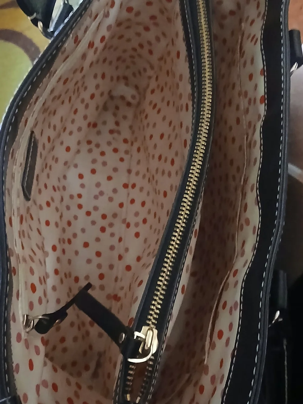 kate spade black leather satchel with polka-dot interior